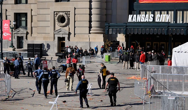 Law enforcement personnel approach Union Station following a shooting at the Kansas City Chiefs NFL football Super Bowl celebration in Kansas City, Mo., February 14, 2024. (AP)