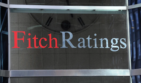 This photo shows signage for Fitch Ratings, Sunday, Oct. 9, 2011, in New York(AP)