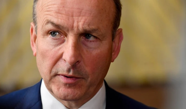 Ireland's Prime Minister Micheal Martin speaks with the media as he arrives for an EU summit in Brussels, Thursday, Oct. 20, 2022. (AP)