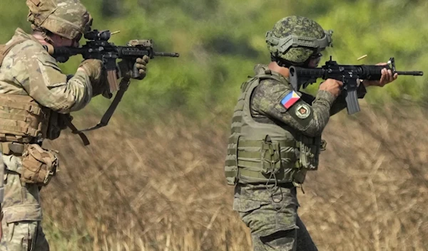 Illustrative: A US and a Filipino soldier during a joint military drill at Fort Magsaysay in the northern Philippines on April 4, 2023. (AP)