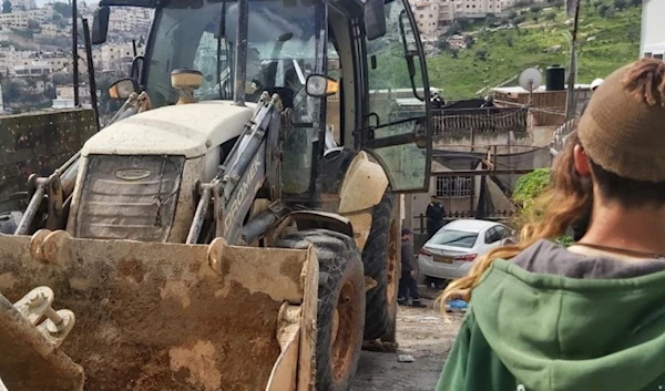 Protected by Israeli occupation forces, settlers seize land in the Batn al-Hawa neighborhood in Silwan, south of Al-Aqsa Mosque on February 20, 2024. (Social media)