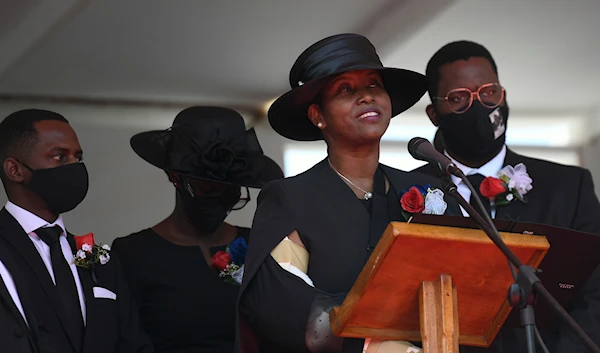 Former first lady of Haiti, Martine Moise, speaks during the funeral of her slain husband, former President Jovenel Moise, accompanied by her children in Cap-Haitien, Haiti, Friday, July 23, 2021.(AP)