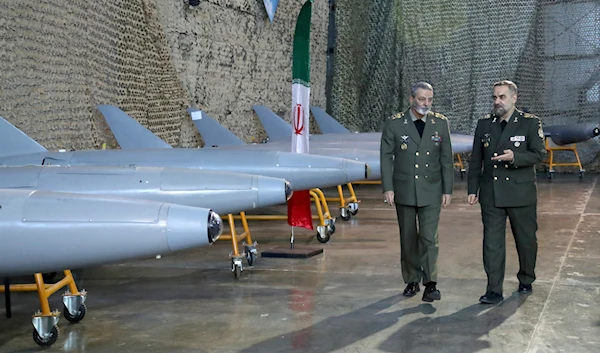 In this image released by the Iranian Defense Ministry on, January 23, 2024, Defense Minister Gen. Mohammad Reza Gharaei Ashtiani talks with army commander Gen. Abdolrahim Mousavi, in a ceremony, Iran (AP)