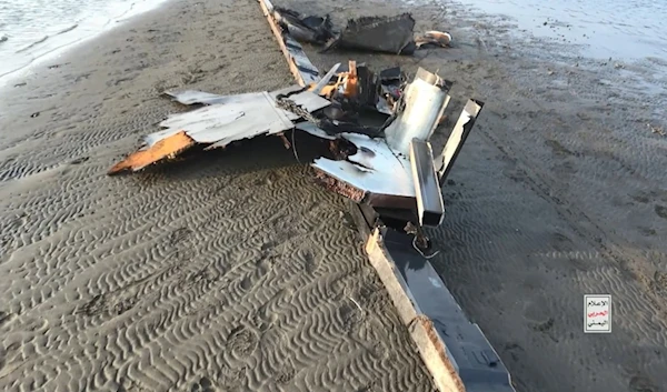 A photo showing the remains of the MQ-9 US-made drone after Yemeni air defense systems fired at it and took it down over al-Hodeidah on Monday, February 19, 2024.( YAF Military Media)