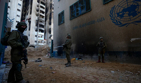 IOF troops surround the UNRWA headquarters during a ground operation in Gaza, on Thursday, Feb. 8, 2024.(AP)