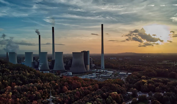 The sun sets behind the cole-fired power plant 'Scholven' of the Uniper energy company in Gelsenkirchen, Germany, on Oct. 22, 2022(AP)