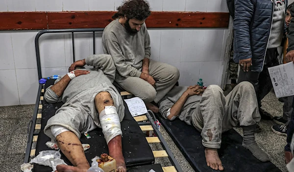 Former Palestinian detainees receiving treatment at a hospital in Rafah, in southern Gaza, after the Israeli military released them. (AFP via Getty Images)