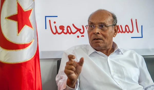 Former Tunisian President and head of el-Harak party Moncef Marzouki speaks to The AP in Tunis, on Aug.28, 2019. (AP)