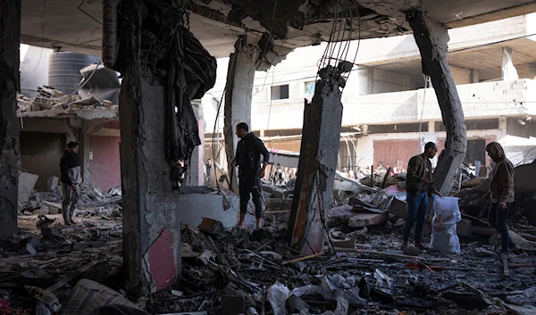 Palestinians check destruction by an Israeli strike in Rafah, Gaza Strip, Saturday, Feb. 24, 2024. (AP)