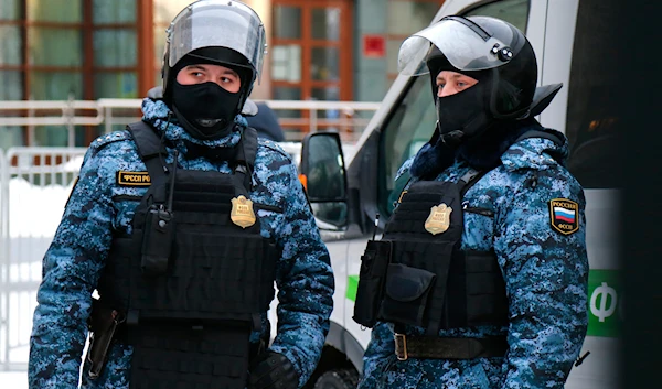 Federal Bailiff service officers stand guard at the Babushkinsky district court before the start of the trial against Alexey Navalny in Moscow, Russia, Saturday, Feb. 20, 2021.(AP)