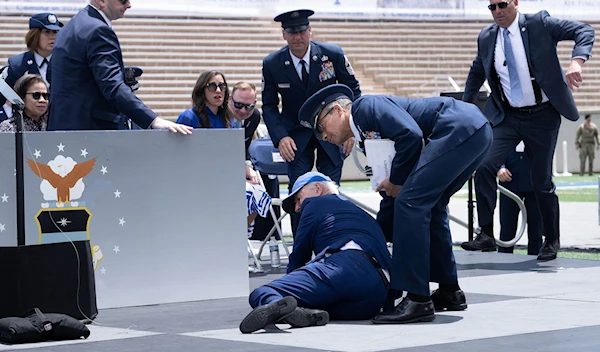 President Joe Biden tripped on a sandbag and fell as he completed handing out diplomas at the US Air Force Academy commencement in Colorado, US, on June 1st, 2023 (CNN)