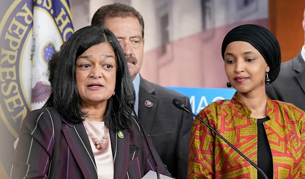 Congressional Progressive Caucus Chair Rep. Pramila Jayapal, D-Wash., left, speaks about the threat of default as Rep. Ilhan Omar, D-Minn. during a news conference, May 24, 2023, in Washington. (AP)