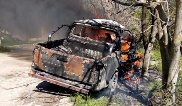 Burnt Hay'at Tahrir al-Sham vehicle that was struck by a Syrian Army drone in Lattakia on February 28, 2024 (Social media)