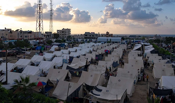 A UNDP-provided tent camp for forcibly displaced Palestinians by the Israeli bombardment of the Gaza Strip is seen in Khan Younis, on Oct. 19, 2023. (AP)