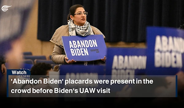 'Abandoned Biden' placards were present in the crowd before Biden's UAW visit