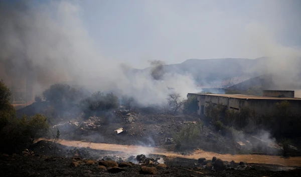 Fields burn following a hit by a rocket fired from Lebanon near the northern settlement of "Kiryat Shmona", Wednesday, Aug. 4, 2021 (AP)