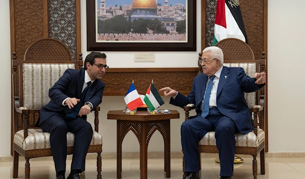 Palestinian President Mahmoud Abbas, right, receives French foreign minister Stéphane Séjourné at his office in the West Bank city of Ramallah, Monday, Feb. 5, 2024(AP)