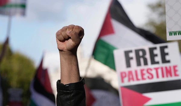 Protesters participate in a pro-Palestinian demonstration in London, Saturday, Oct. 14, 2023.(AP)