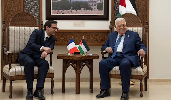 Palestinian President Mahmoud Abbas, right, receives French foreign minister Stéphane Séjourné at his office in Ramallah, Monday, Feb. 5, 2024. (AP)