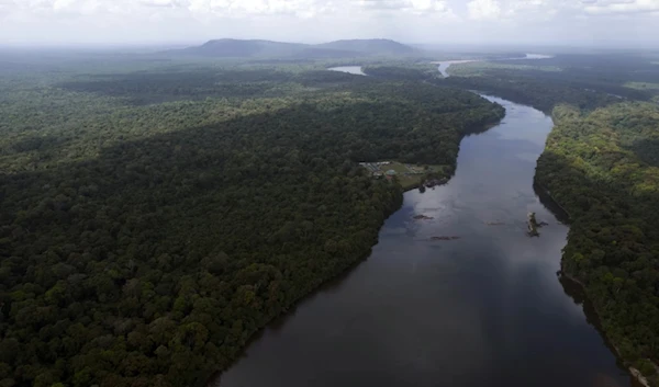 The Essequibo river flows through Kurupukari crossing, Nov. 19 2023. (AP)