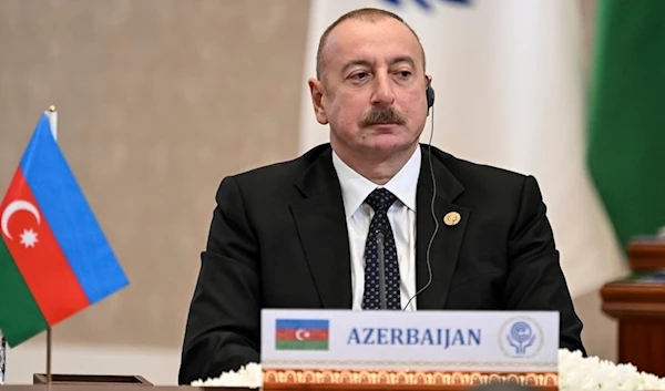 n this photo released by Uzbekistan's President Press Office, Azerbaijan's President Ilham Aliyev attends the Summit of the Economic Cooperation Organisation (ECO) in Tashkent, Uzbekistan, on Thursday, Nov. 9, 2023 (AP)