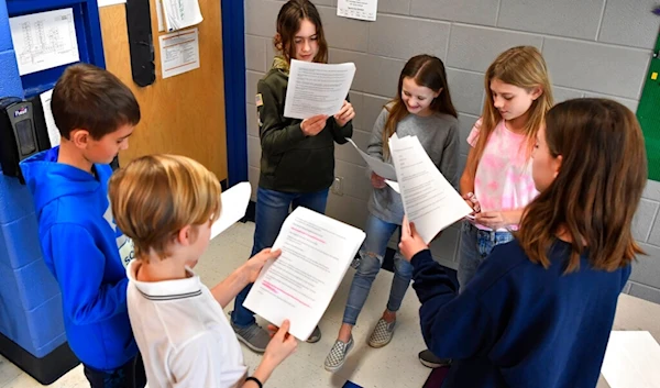 Students rehearse their lines of a three-scene play written by ChatGPT in Donnie Piercey's class at Stonewall Elementary in Lexington, Ky., Monday, Feb. 6, 2023.