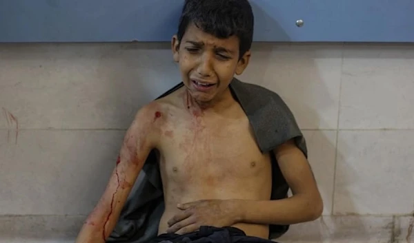 A Palestinian child that survived Gaza's al-Rashid massacre in a hospital in Gaza on February 29.(X, @AbwBwd89445)