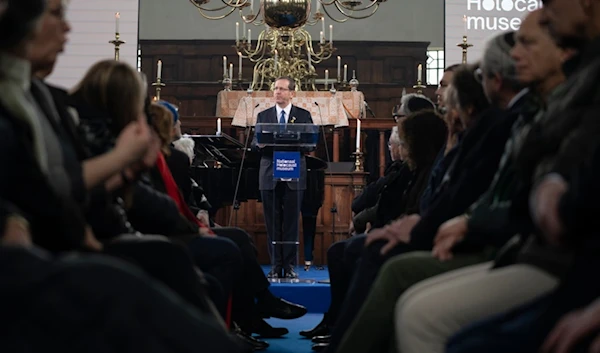 Israel's President Isaac Herzog speaks at the Portuguese Synagogue during a ceremony marking the opening of the new National Holocaust Museum in Amsterdam, Netherlands, Sunday, March 10, 2024. (AP)