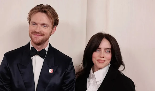 Finneas O'Connell and Billie Eilish at the Oscars 2024 (AFP via Getty Images)