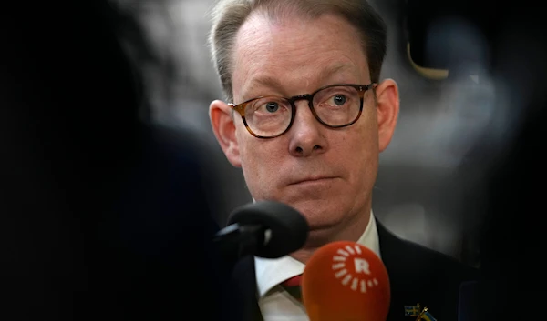 Sweden's Foreign Minister Tobias Billstrom speaks with the media as he arrives for a meeting of EU foreign ministers at the European Council building in Brussels, Monday, Jan. 22, 2024. (AP)