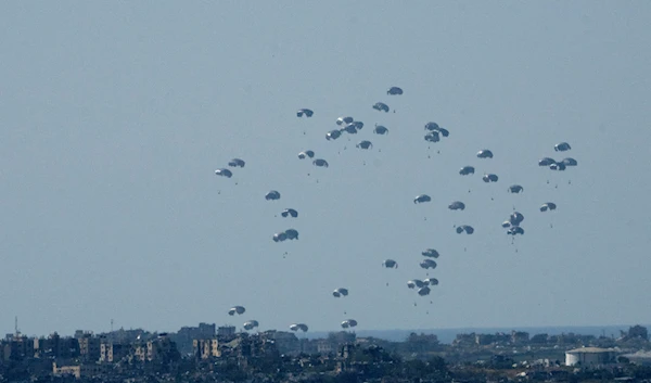 Parachutes drop humanitarian aid into the northern Gaza Strip on March 11, 2024. (AP)