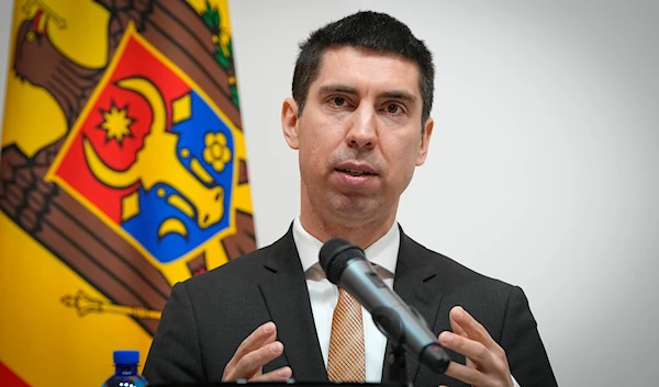 Moldova's Foreign Minister Mihai Popsoi, attends a joint news conference with Ukraine's Foreign Minister Dmytro Kuleba in Kiev, Ukraine, Wednesday, March. 13, 2024. (AP)