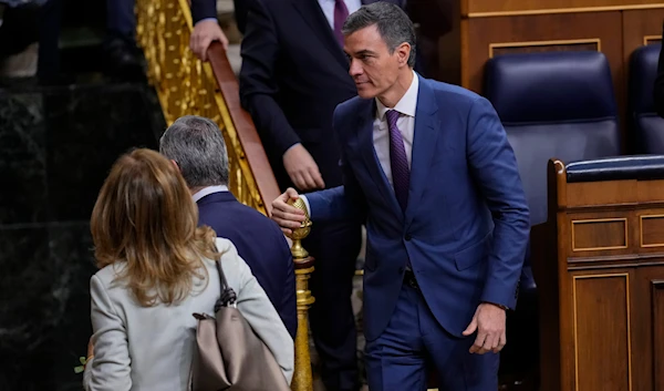 Spain's Socialist Prime Minister Pedro leaves the Spanish Parliament in Madrid, Spain, Thursday, March 14, 2024 (AP)