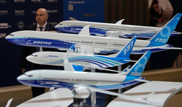 Aircraft models of Boeing are on display during the Singapore Airshow in Singapore, Thursday, Feb. 22, 2024. (AP Photo/Vincent Thian)