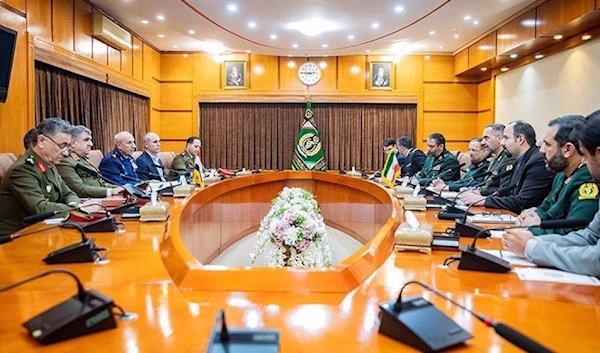 Iran's Defense Minister Brigadier General Mohammad Reza Ashtiani (4th R) and his Syrian counterpart Ali Mahmoud Abbas (3rd L) meet in Tehran on March 16, 2024. (Photo by Tasnim news agency)