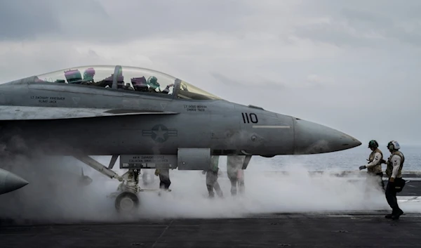 F/A-18F Super Hornet fighter jet takes off from the aircraft carrier U.S.S. Dwight D. Eisenhower, also known as the 'IKE', in the south Red Sea, Tuesday, Feb. 13, 2024. (AP Photo/Bernat Armangue)