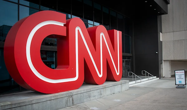 The CNN logo is displayed at the entrance to the CNN Center in Atlanta on Wednesday, Feb. 2, 2022 (AP)