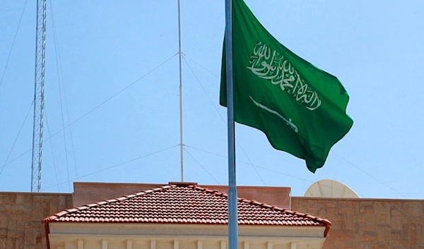 The Saudi Arabian flag waves over the newly opened consulate building in Baghdad, Iraq, Thursday, April 4, 2019. (AP)