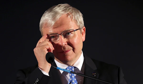 Australian Prime Minister Kevin Rudd adjusts his glasses during a speech at a pre-election rally in Mt. Druitt, Australia on September 6, 2013. (AP)