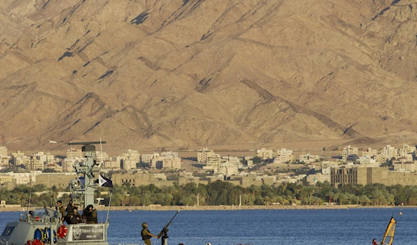 An Israeli naval ship during Israeli Prime Minister Benjamin Netanyahu's speech, unseen, at a port in the Red Sea in 'Eilat' settlement, southern occupied Palestine, Monday, March 10, 2014. (AP)