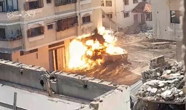 Al-Qassam Brigades destroy an Israeli occupation tank near the al-Shifa Medical Complex in Khan Younis on March 21, 2024. (Military media).png