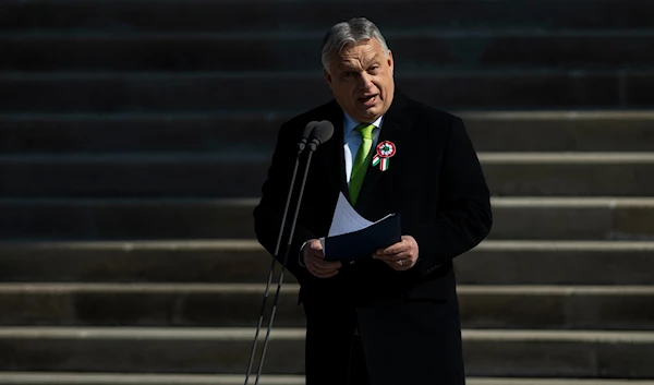 Hungarian Prime Minister Viktor Orban gives a speech on the steps of the National Museum in Budapest, Hungary, on Friday, March 15, 2024.(AP)