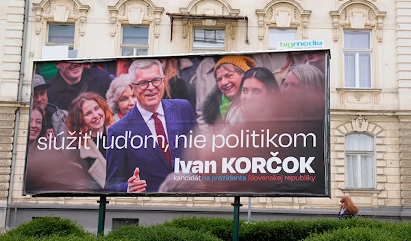 a poster for former Foreign Minister Ivan Korcok, a pro-Western career diplomat, one of the nine candidates in the upcoming Slovakia's presidential election, in Slovakia, March 22, 2024. (AP)