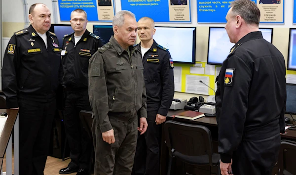 In this photo released by Russian Defense Ministry Press Service on Sunday, March 17, 2024, Russian Defense Minister Sergei Shoigu, center, visits the Black Sea Fleet's headquarters. (AP)