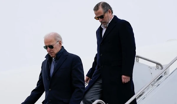 US president Joe Biden and his son Hunter Biden step off Air Force One at Hancock Field Air National Guard Base in Syracuse, New York, February 4, 2023. (AP)