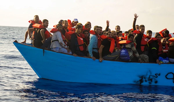 Migrants are rescued from the sea some 30 miles off Libya by the members of the humanitarian ship Geo Barents, Friday, Oct. 6, 2023. (AP)