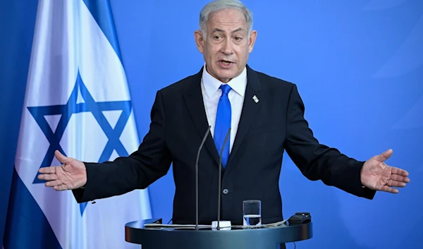 Israeli Prime Minister Benjamin Netanyahu speaks at a press conference in Berlin on March 16, 2023. (AFP)