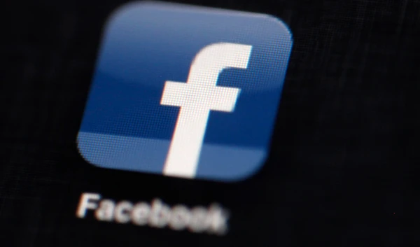 file photo shows the Facebook logo displayed on an iPad in Philadelphia on March 16, 2012. (AP)