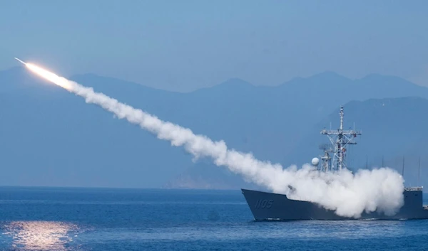 A Cheng Kung class frigate fires an anti air missile as part of a navy demonstration in Taiwan's annual Han Kuang exercises off the island's eastern coast near the city of Yilan, Taiwan, July 26, 2022. (AP)