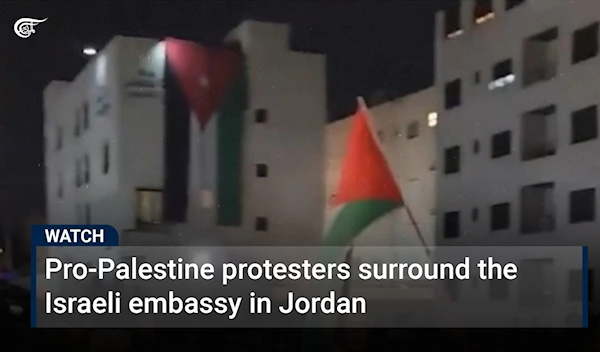 Pro-Palestine protesters surround the Israeli embassy in Jordan